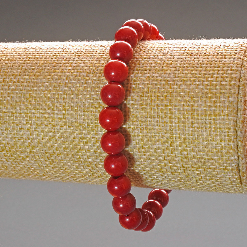 Bransoletka z naturalnego koralu, gładkie kule o średnicy około 8 mm, długość około 18 cm (rozciągliwa)