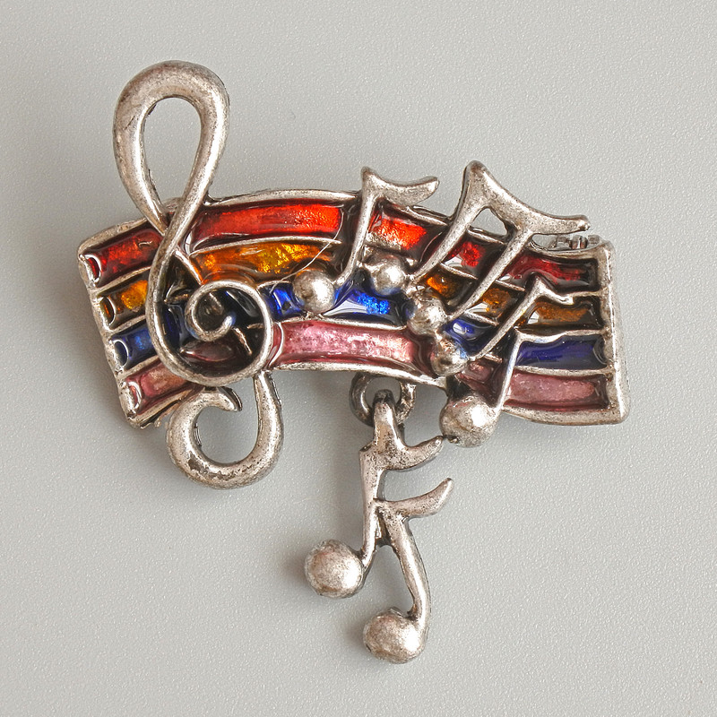 Broszka Nuty w różnobarwnej emalii, srebrny metal 33×26 mm