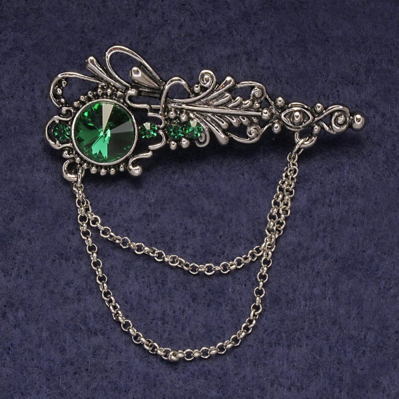 Broszka Akcent z zielonymi kryształami i kryształem, metal srebrzysty 55×22 mm