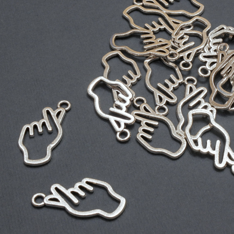 Zawieszka jubilerska „Ręka”, wymiary 12×24 mm +/- opakowanie 20 g, 21 szt.