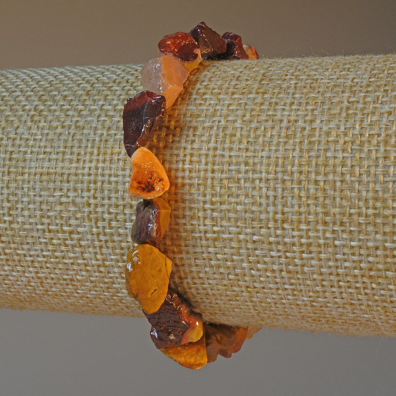 Bransoletka z jaspisu mookaite – naturalny, fasetowany kamień, średnica 8×10 mm, długość 18 cm (na gumce)