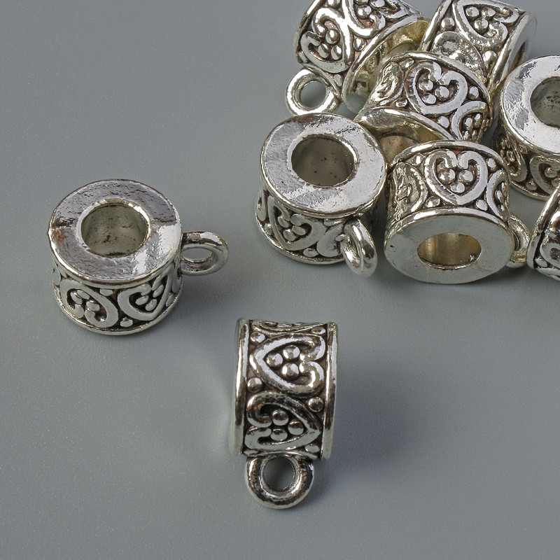 Zawiesie do biżuterii, średnica 7×9,5 mm, otwór 4,5 mm, opakowanie 9 sztuk, masa 20 g