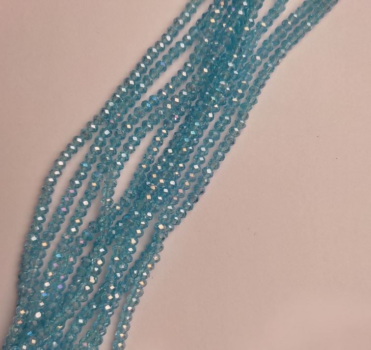 Koraliki czeskiego kryształu na żyłce, niebieskie z benzynowym połyskiem, fasetowane rondelki, średnica 3,5×2,5 mm + -, długość 38 cm +