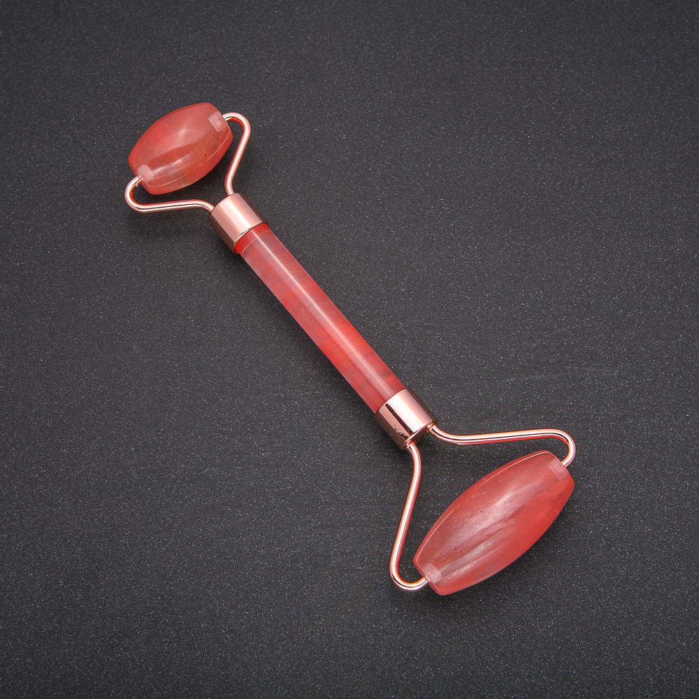 Masażer rolkowy z chalcedonem, metal złoty, długość 14,5 mm