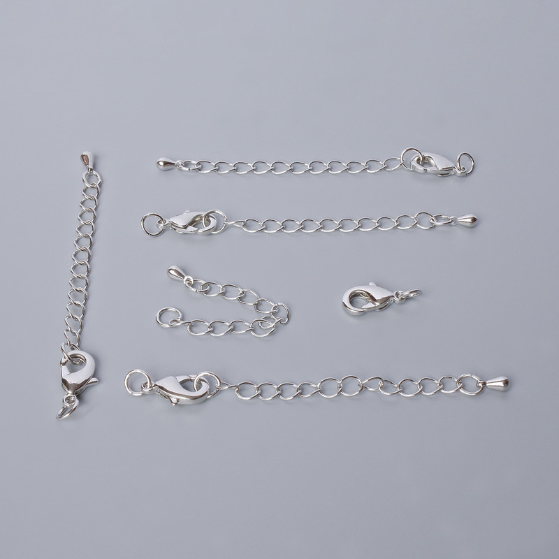 Eleganckie zapięcie karabińskie, średnica 12×6 mm z przedłużającym łańcuszkiem, długość 5,5 cm, srebrny kolor metalu, 1 szt.