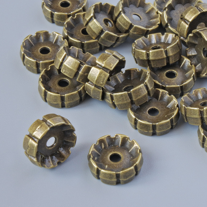 Brązowa koralika-wstawka o średnicy 10×3,5 mm, średnica otworu 2 mm, fasetowana, 22 szt. ±, kolor metalu: brązowy