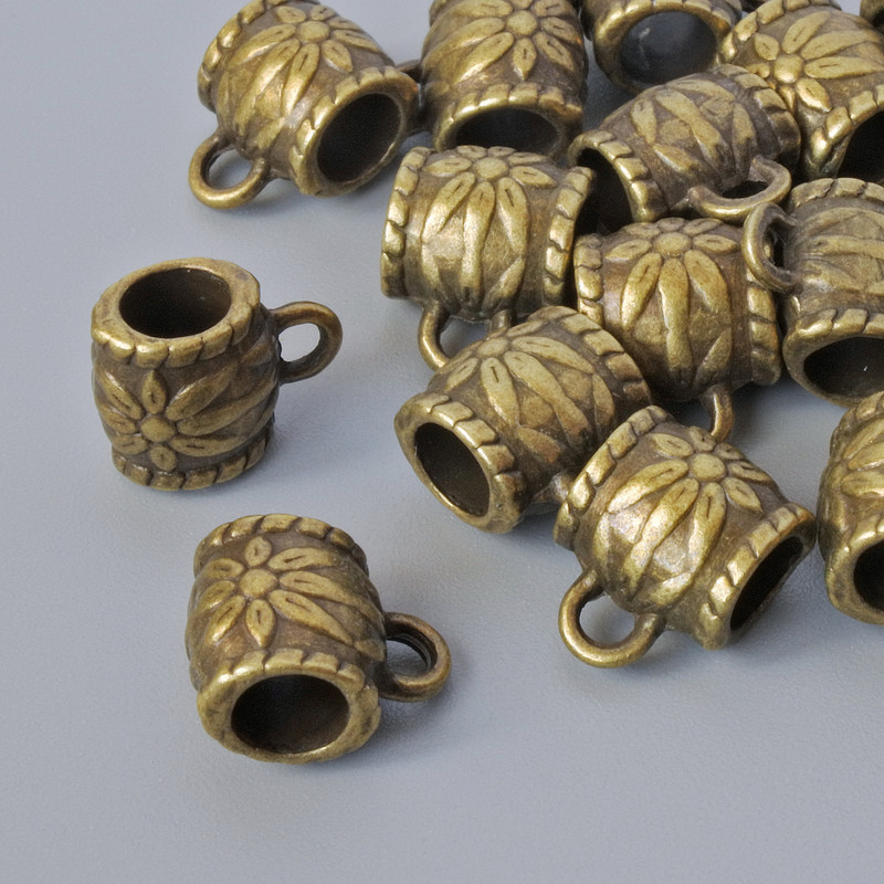 Zawieszka bail, brązowa, 8×6 mm, średnica otworu 1,7 mm i 4 mm, długość 10 mm, opakowanie 18 sztuk, kolor metalu: brązowy