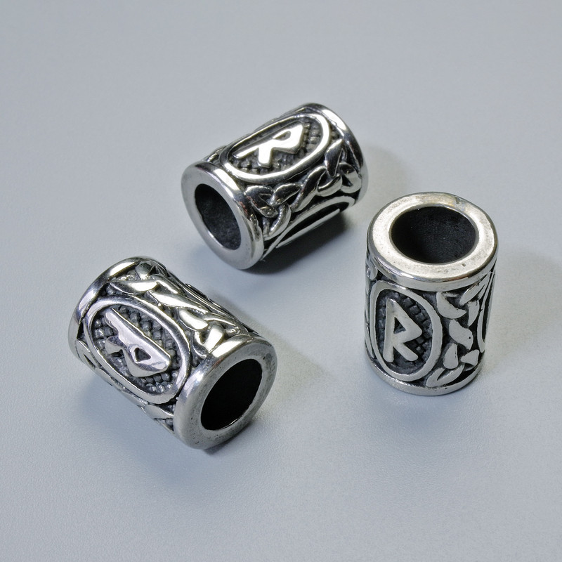 Koralik ozdobny „Nordyjska runa”, srebrzysty kolor metalu, średnica 13×10 mm, otwór 6 mm, 1 szt.