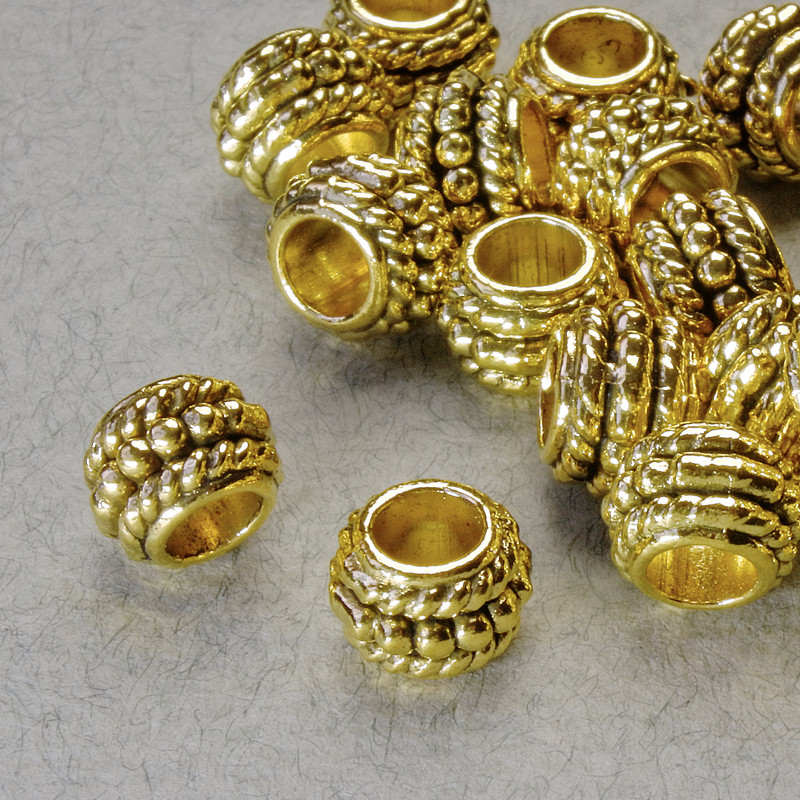 Akcesoria biżuteryjne – koralik-wkładka, średnica 8,5×6 mm, otwór 4,5 mm, złoty kolor metalu, opakowanie 20 g +/- 26 szt.