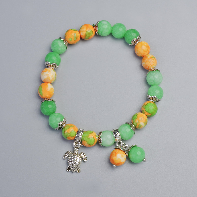 Bransoletka „Wariacyt” (sztuczny akryl) i nefryt (sztuczny), średnica 8,5 mm +/- (elastyczna baza), długość 18 cm +/- z metalowymi wstawkami