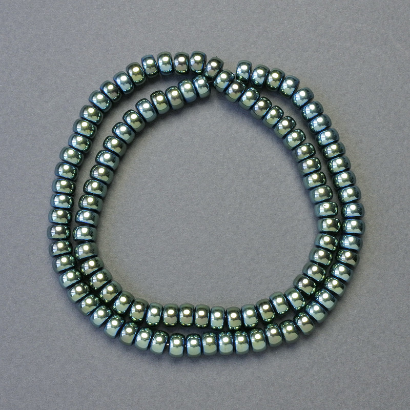 Koraliki hematitu w kolorze zielony chameleonowy, średnica 6×4 mm, długość ok. 42 cm
