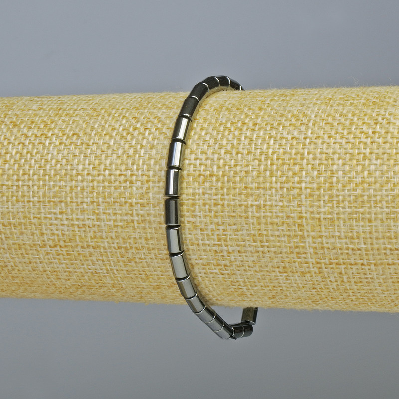 Bransoletka z hematytu o cylindrycznym kształcie, kolor czarny, średnica 6×4 mm, długość 18 cm, elastyczna