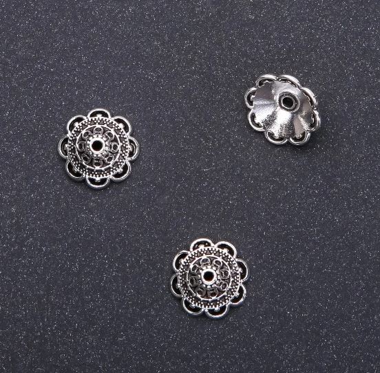 Końcówka do biżuterii, średnica 14×6 mm, wewnętrzna średnica 1,5 mm, opakowanie 20 g, 16 szt. (+-)