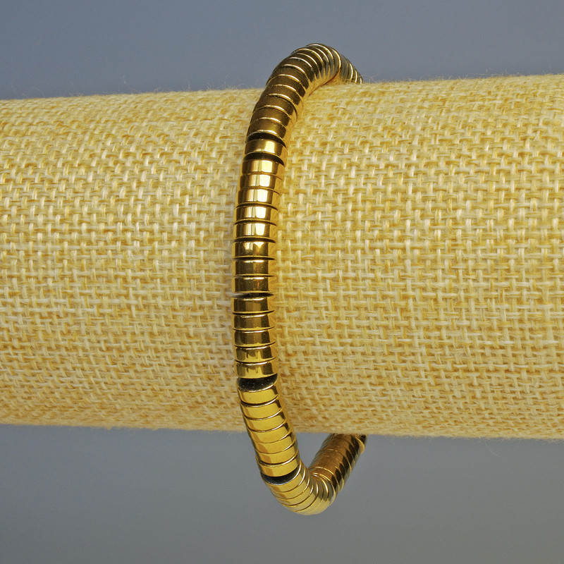 Bransoletka z hematytu w kolorze ciemnego złota, średnica 6×2 mm, długość 18 cm, elastyczna