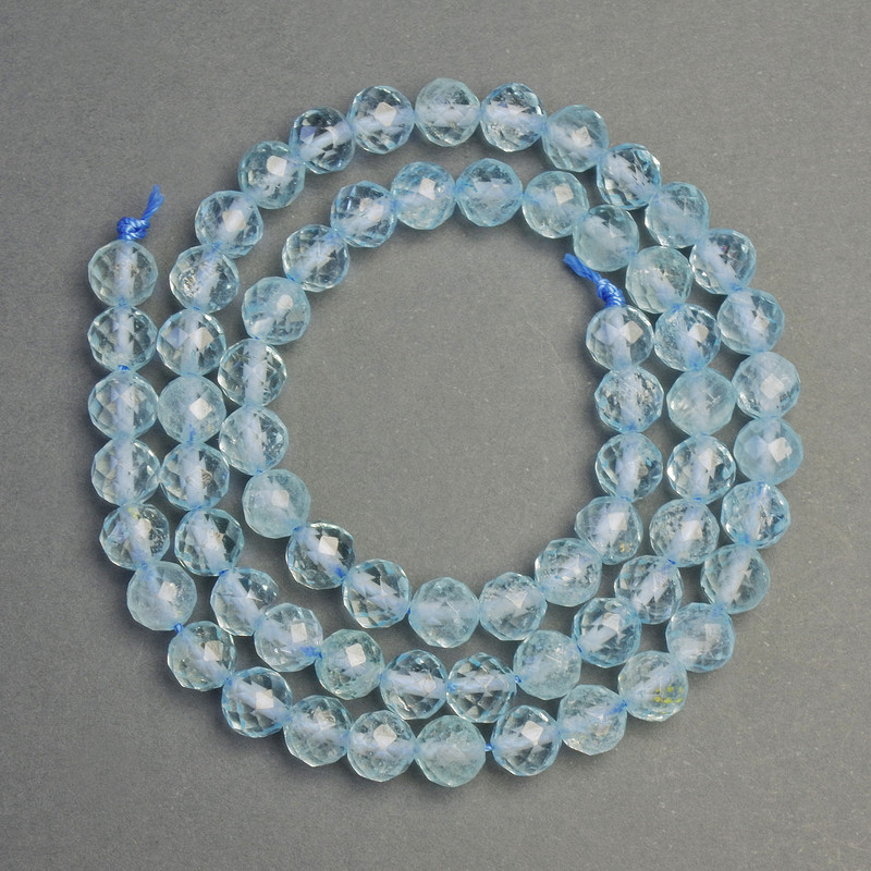 Koraliki z naturalnego kamienia Topaz fasetowana kulka, średnica 6,5 mm+-, długość 39 cm+