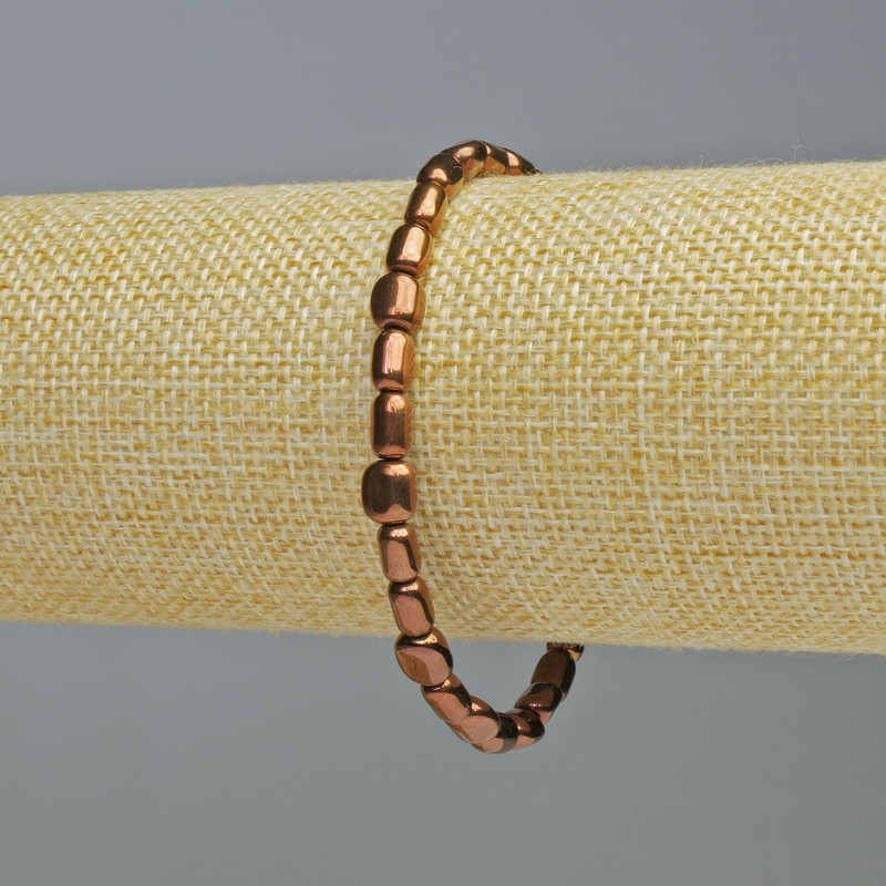 Bransoletka hematyt w kolorze miedzi, owalne koraliki 7×6 mm, długość 18 cm, elastyczna