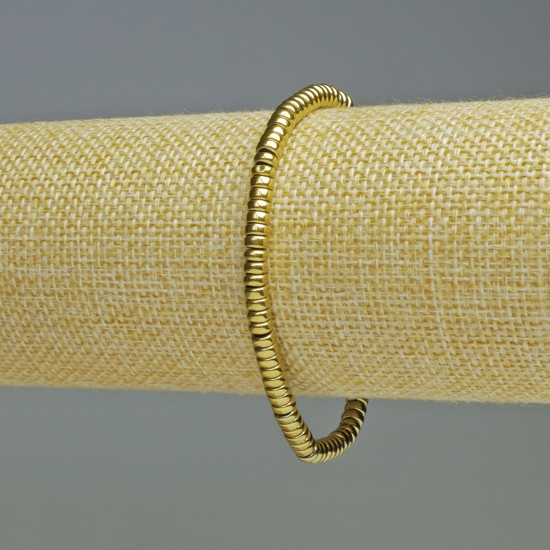 Bransoletka hematytu w kolorze złotym, rondelki o średnicy 4×2 mm, długość 18 cm, elastyczna