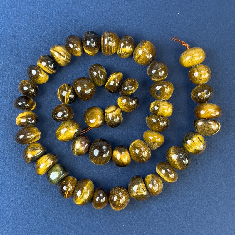 Koraliki Tygrysie Oko fasetowane 11×10 mm na nitce, długość 40 cm+