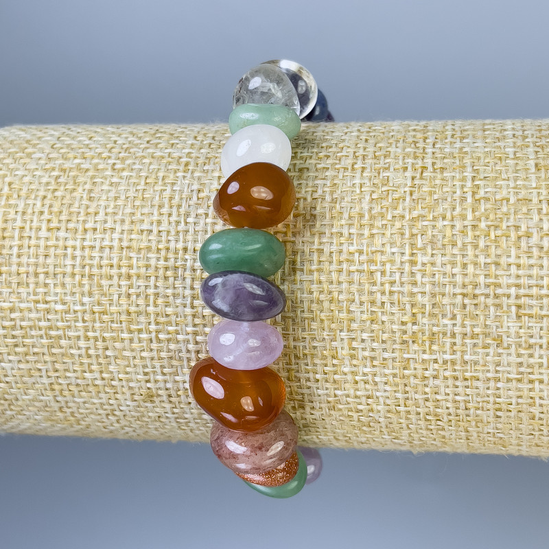 Bransoletka z asortymentu fasetowanych koralików, średnica 7–13×6–9 mm, długość 18 mm, elastyczna