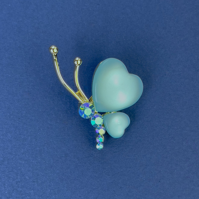 Broszka Motyl, średnica 34×21 mm ± błękitne Kocie Oko, kryształy, metal złocisty