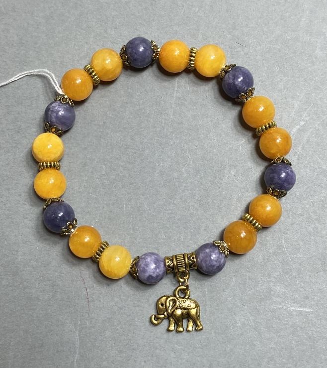 Bransoletka z gładkich kulek akrylowych o średnicy 8 mm ±, z metalowymi wstawkami, długość 18 cm ±, elastyczna