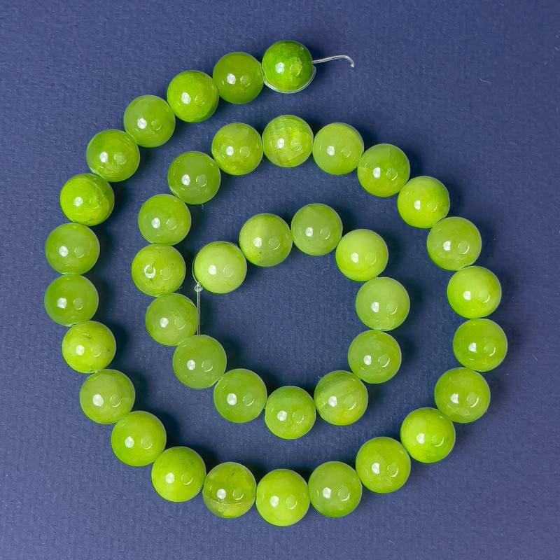 Koraliki onyksu - gładkie kule, średnica 10 mm, długość 40 cm, na żyłce jubilerskiej