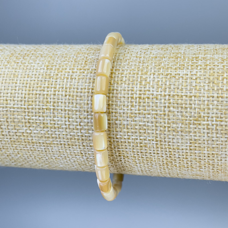 Bransoletka z masy perłowej fasetowana, średnica 6×5 mm ±, długość 18 cm ±, na elastycznej gumce