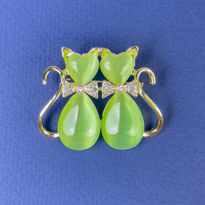 Broszka «Koty» z zielonym Kocim Okiem