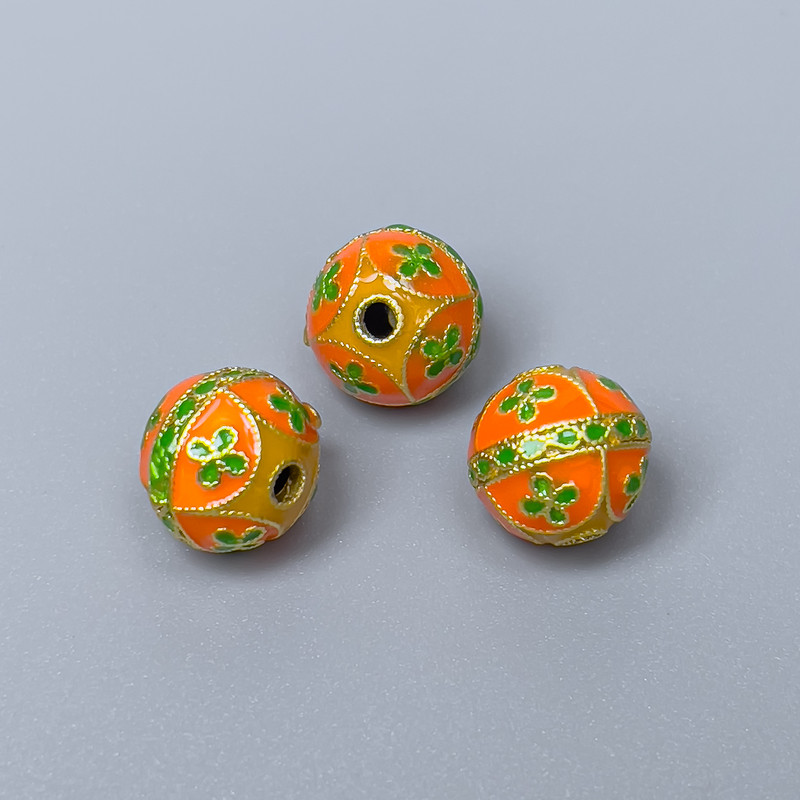 Koralik cloisonné w kolorze pomarańczowo-limonkowym, emalia, średnica 10 mm, otwór 2 mm, kolor metalu złoty, 1 szt.