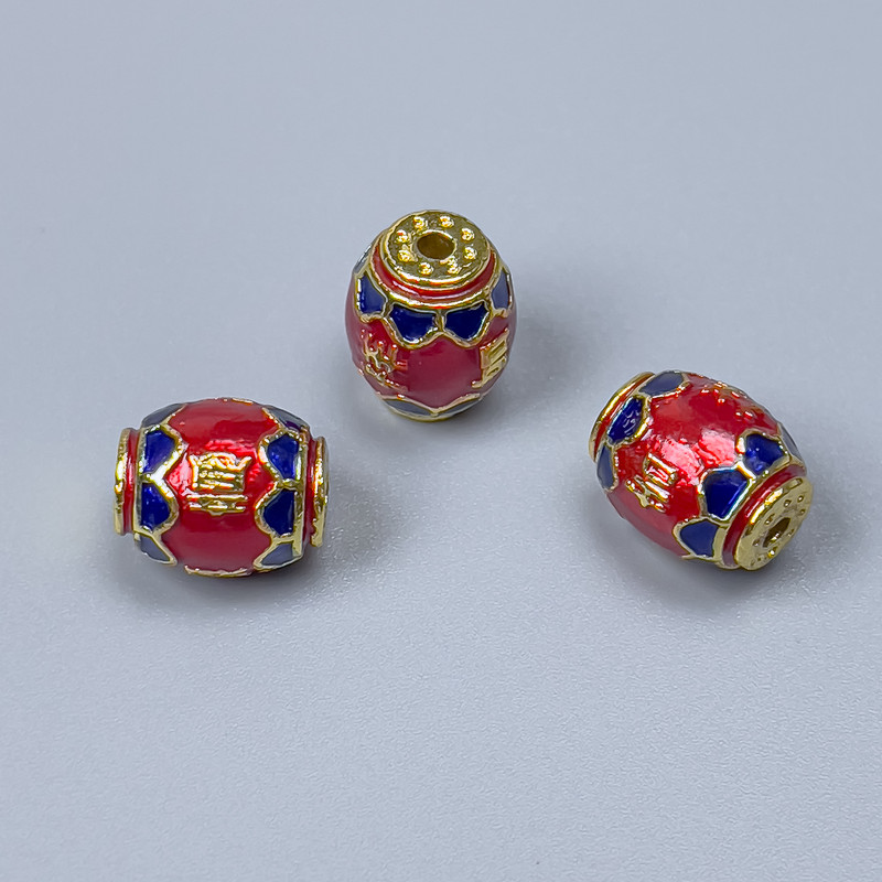 Koralik cloisonné w formie beczki, czerwono-niebieski, 10×8 mm, średnica otworu 1,8 mm, złocisty kolor metalu, 1 szt.