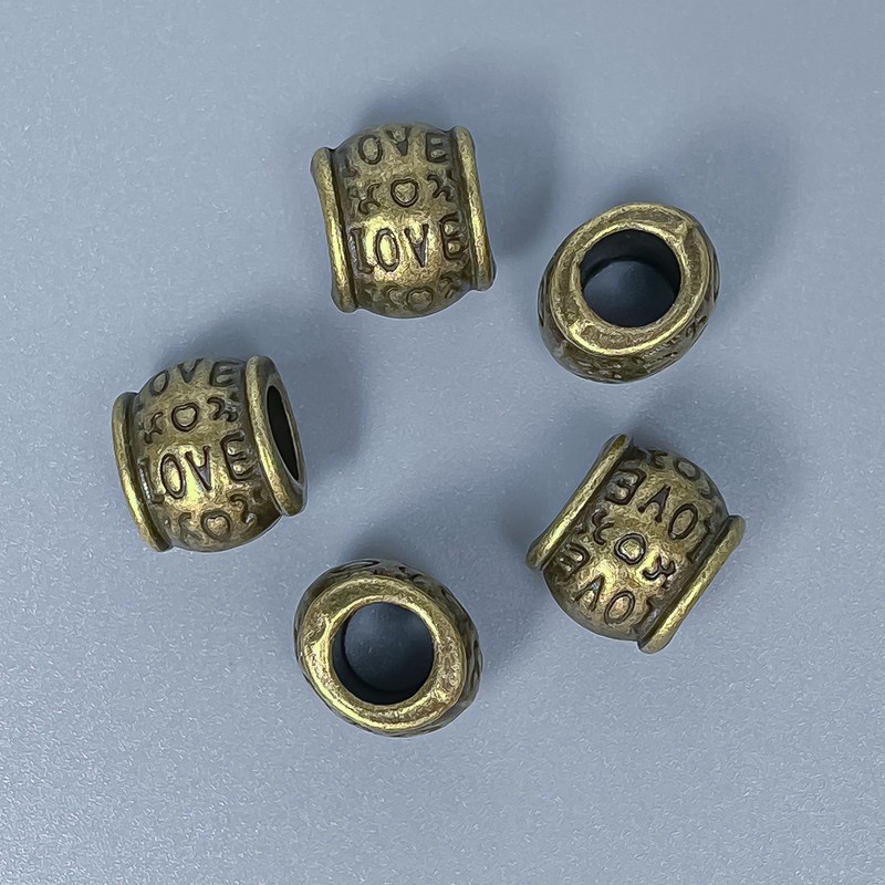 Koralik-wkładka w kolorze brązu, wymiary 9×10 mm ± otwór 5 mm ± opakowanie 10 szt