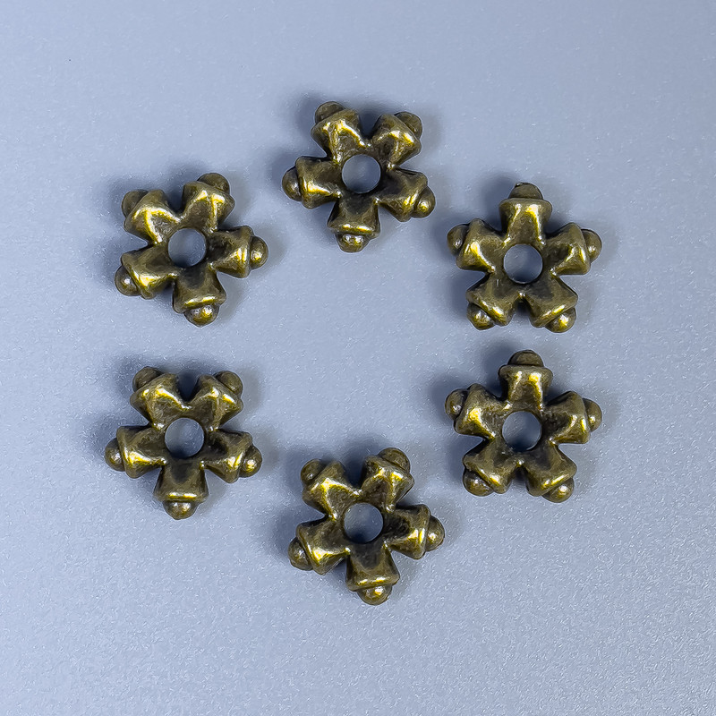 Koralik-wstawka w kolorze brązu, wymiary 11×4 mm ± otwór 3 mm ± opakowanie 20 szt.