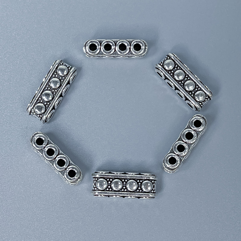 Okucia – rozdzielacz rzędów, wstawka w kolorze metalu: srebro, wymiary 7×5×17 mm, otwór Ø1,8 mm, opakowanie 20 g (~10 szt.)