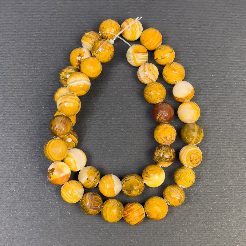 Koraliki onyksowe – kule gładkie, średnica 10 mm, otwór około 1,5 mm, długość 38 cm