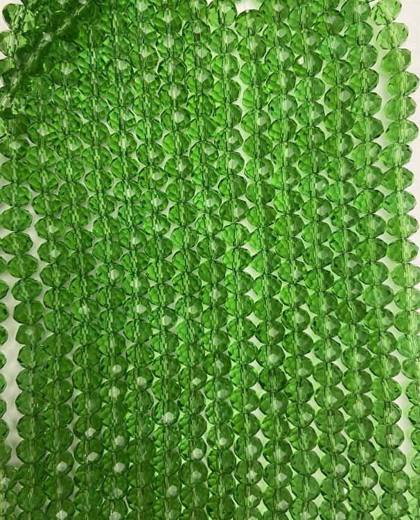 Koraliki czeskiego kryształu na żyłce zielone, przezroczyste, fasetowane rondelki, średnica 8×6 mm, długość około 40 cm