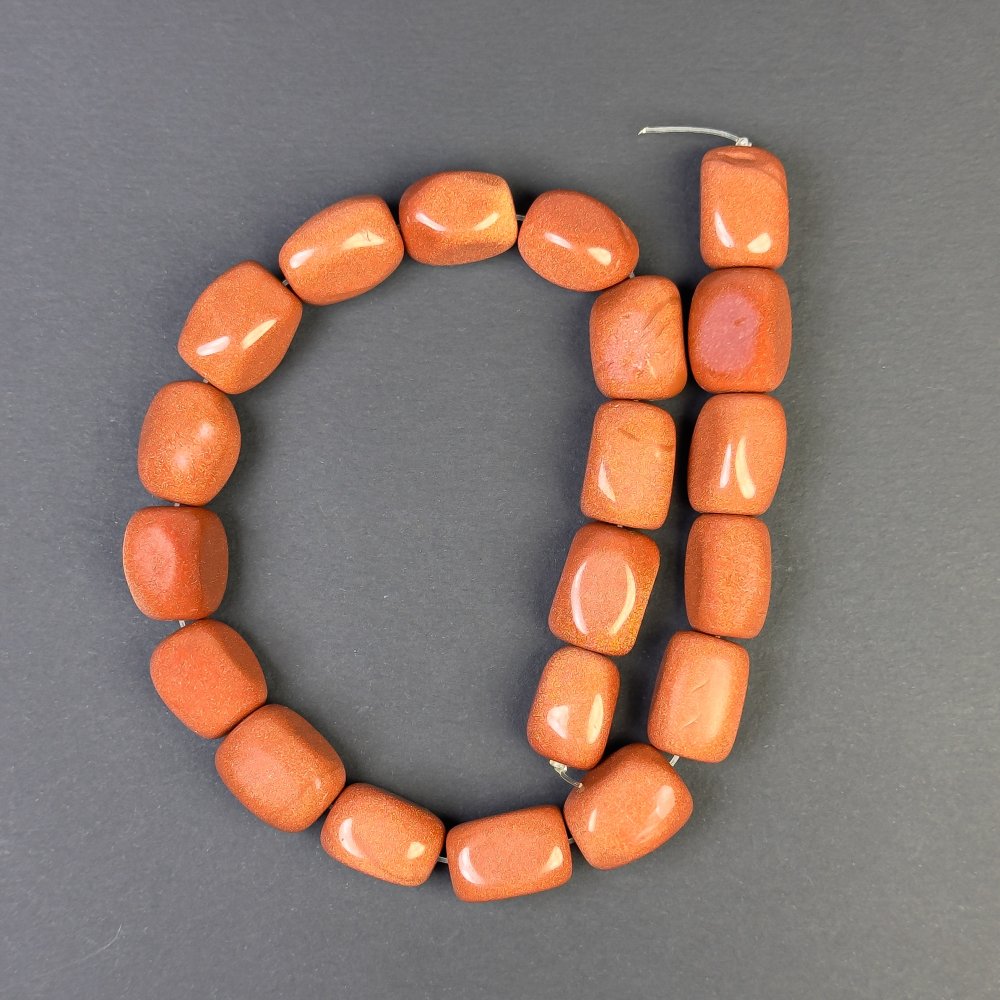 Koraliki z awenturynu „Złoty piasek” fasetowane 20×15 mm, na żyłce, długość 40 cm ±