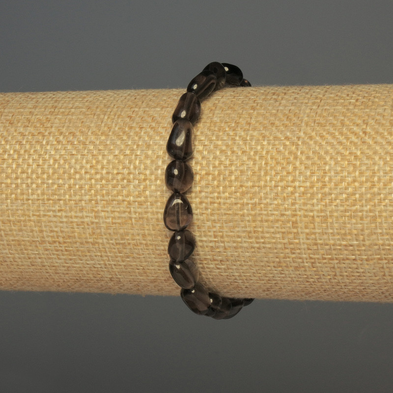 Bransoletka z topazu dymnego, fasetowana, średnica 7–10×7 mm, długość 18 cm, na elastycznej gumce