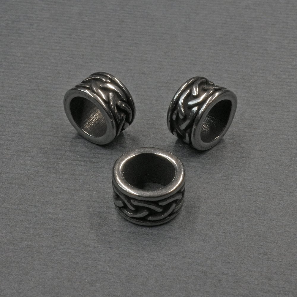 Koralik-wstawka, kolor metalu srebrzysty, średnica 9×5 mm, otwór około 6 mm