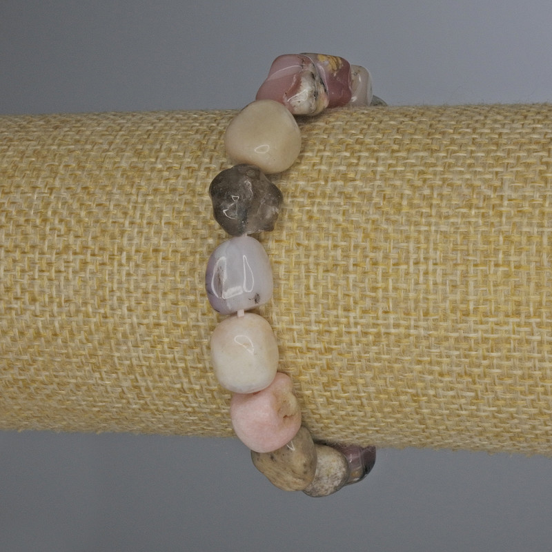 Bransoletka z różowego opalu fasetowanego, średnica 8–12×10 mm, długość 18 cm, elastyczna baza