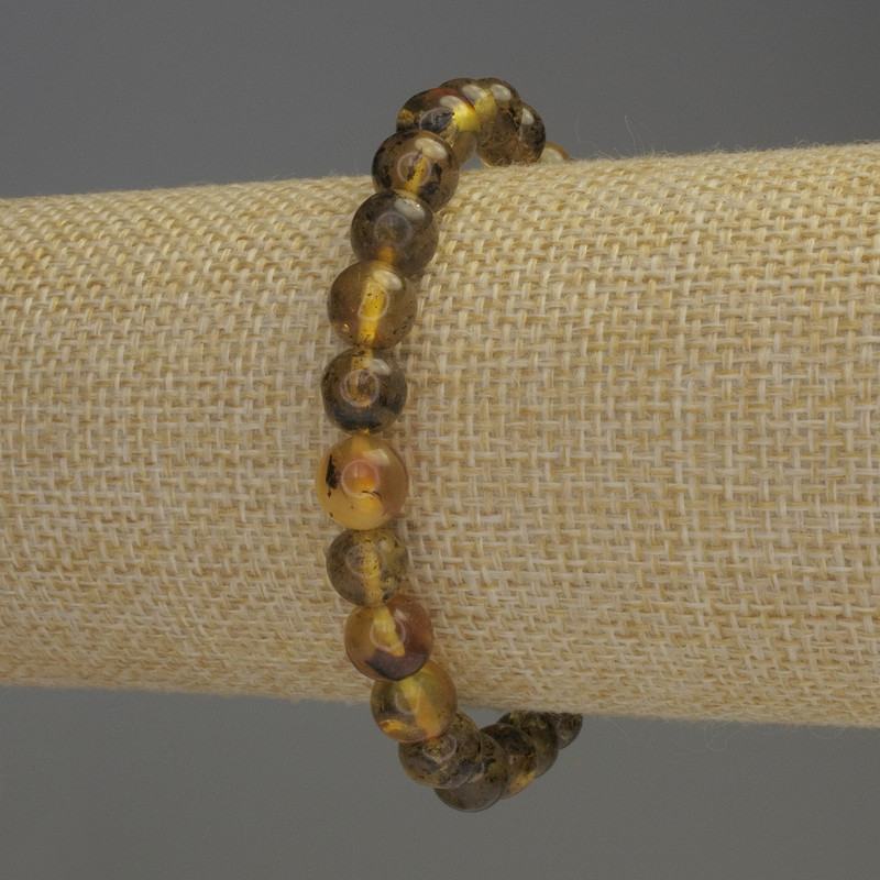 Bransoletka z bursztynu – gładka kulka, średnica 8 mm, długość około 18 cm, elastyczna