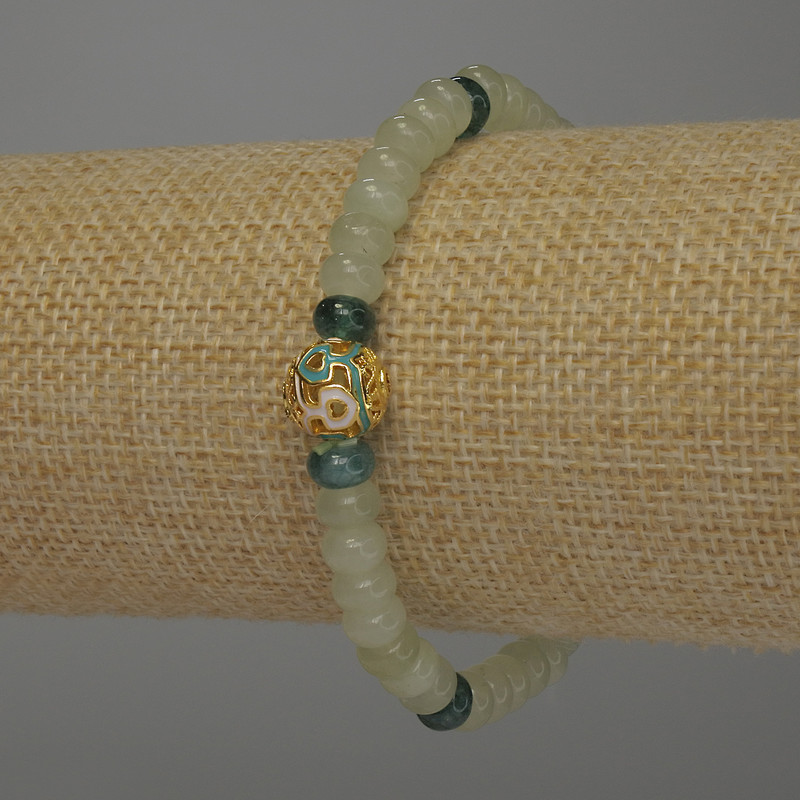 Bransoletka z onyksu w formie rondeli, średnica 6×4 mm, długość 18 cm, na elastycznej nici