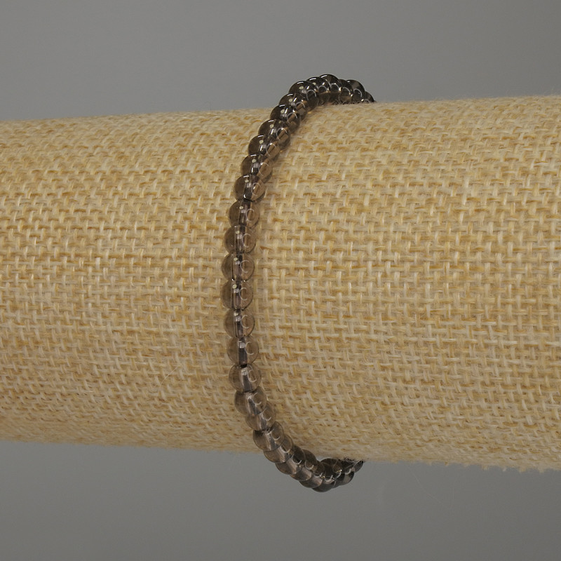 Bransoletka z topazu dymnego, gładka kuleczka, średnica 4 mm, długość 18 cm, elastyczna