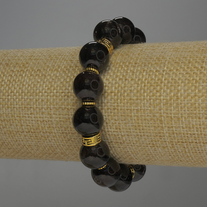 Bransoletka z granatu — gładkie kulki, średnica 12 mm ±, z metalowymi wstawkami, długość 18 cm, elastyczna