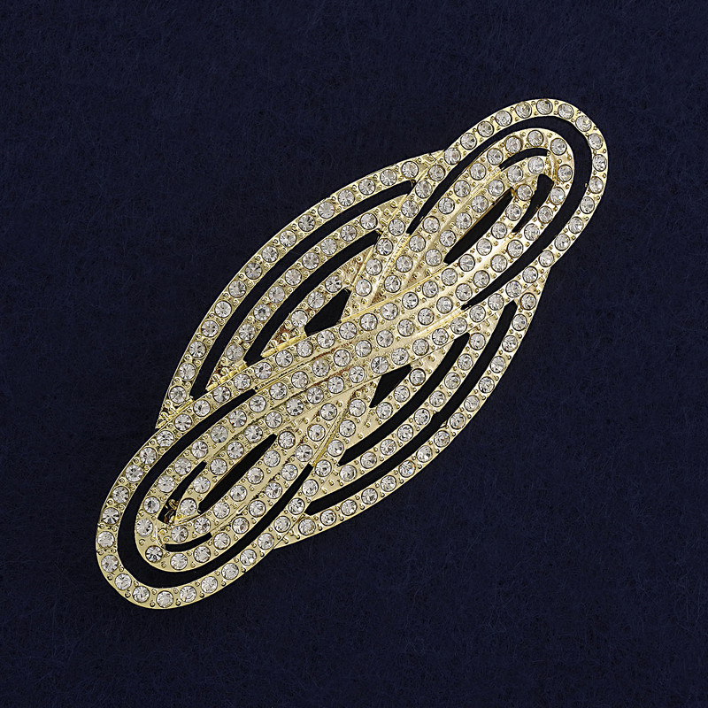 Broszka Akcent z białymi kryształami i złotym metalem 80×33 mm