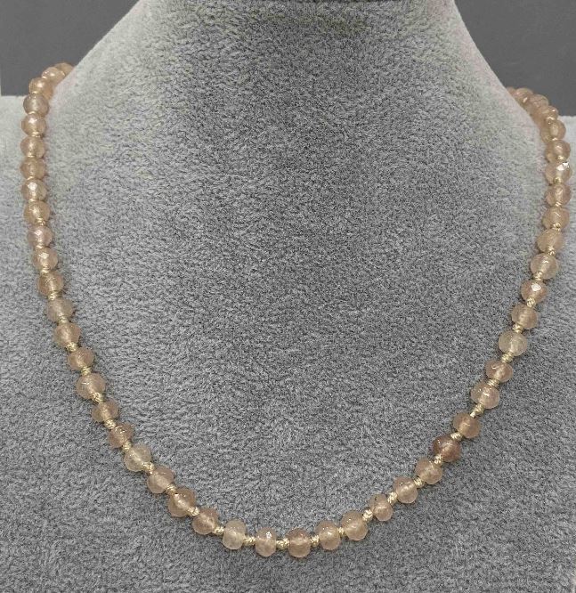 Naszyjnik z sztucznego selenitu, fasetowane rondelki 6x4 mm, długość 50 cm