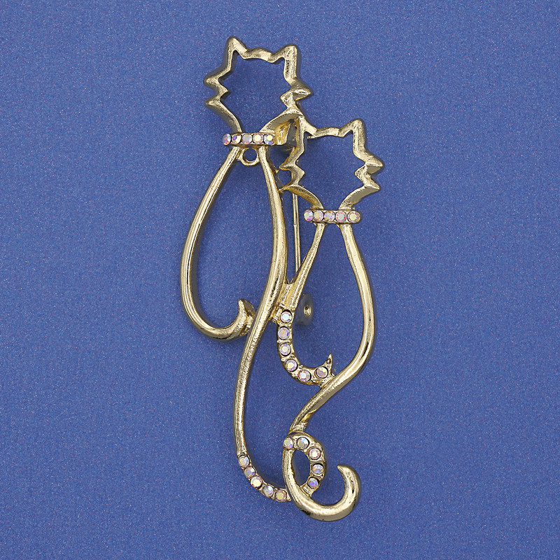 Broszka «Kotki» z tęczowymi kryształami, matowy odcień złotego metalu 58×26 mm+
