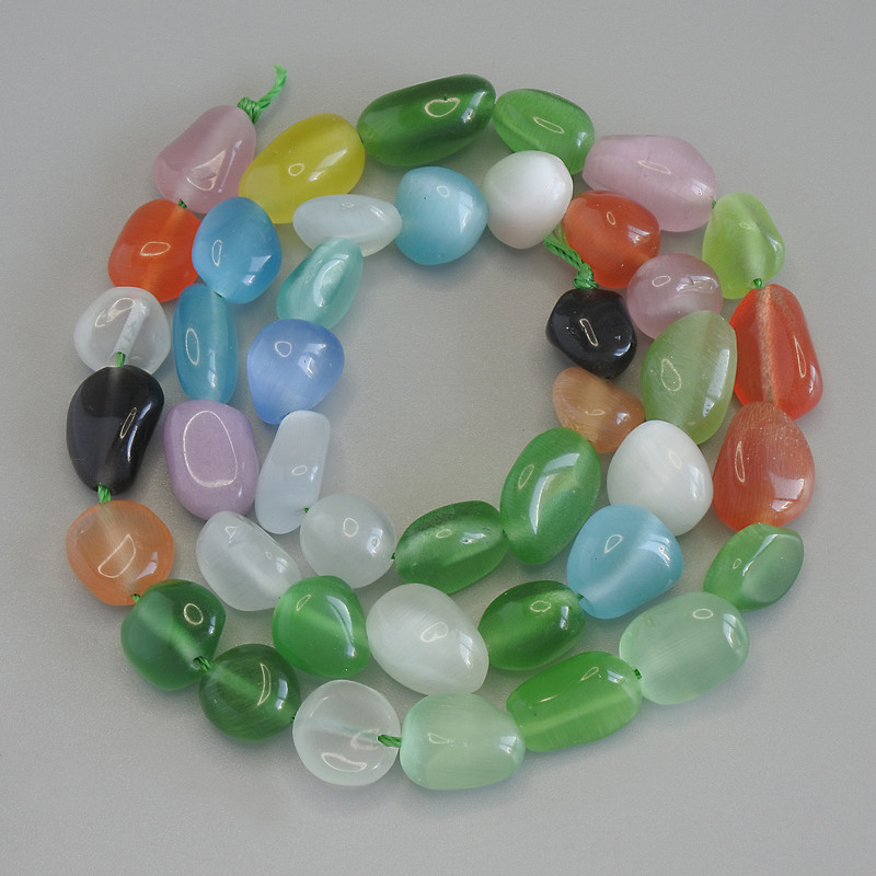 Koraliki wielobarwne Kocie Oko fasetowane, średnica 8–12×9 mm, długość ok. 41 cm, na nitce