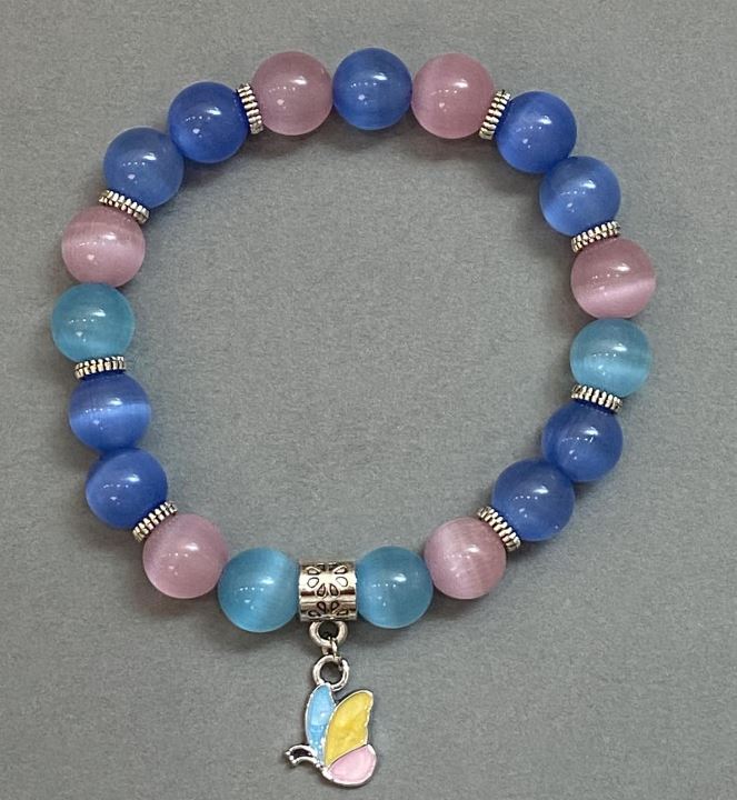 Bransoletka z kamieniem kocie oko, gładkie kulki 9–10 mm, z metalowymi wstawkami, długość 18 cm, elastyczna