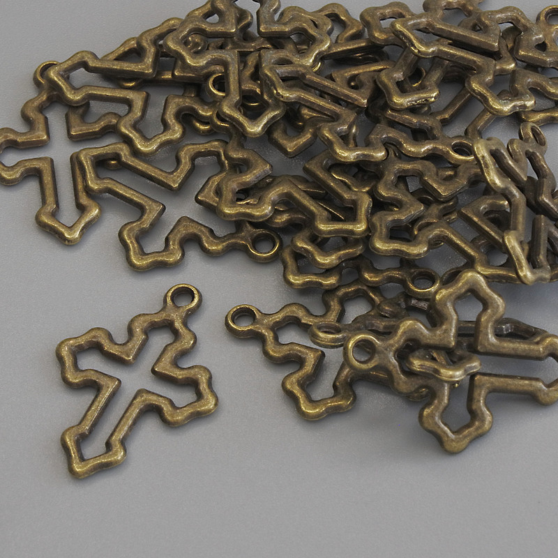 Wisiorek Krzyż, kolor metalu: brązowy, średnica 21×15 mm, opakowanie 23 szt.