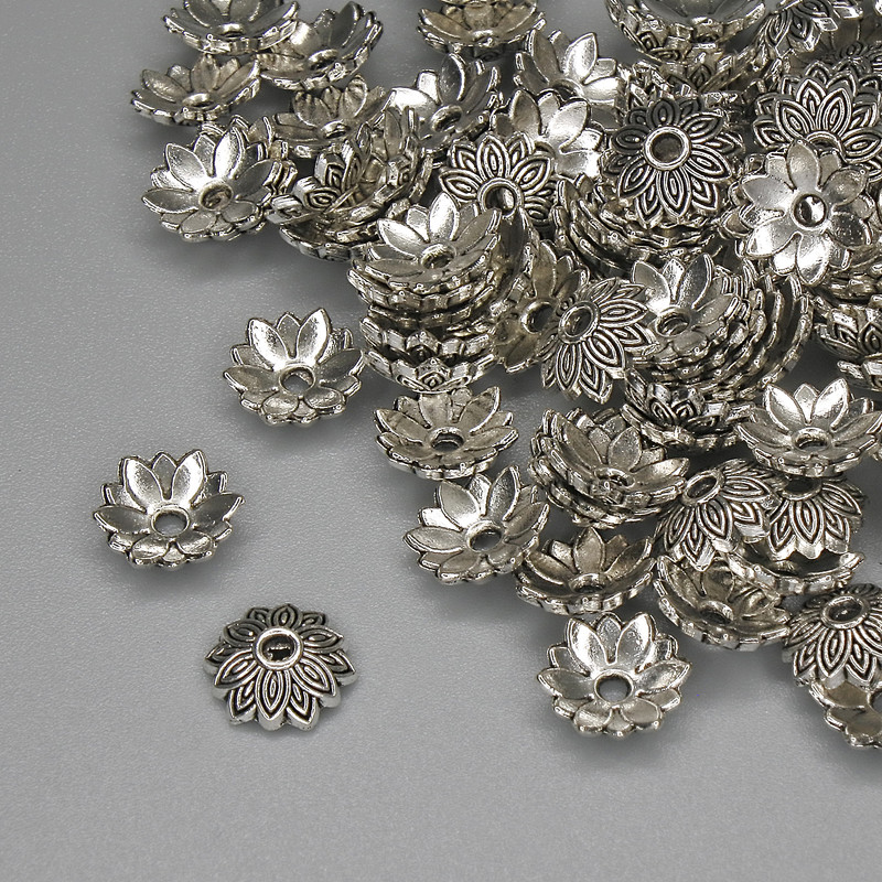 Kapturek do koralików, kolor metalu: srebrny, średnica 7,5×1 mm, otwór 1,5 mm, opakowanie 20 g (~89 szt.)